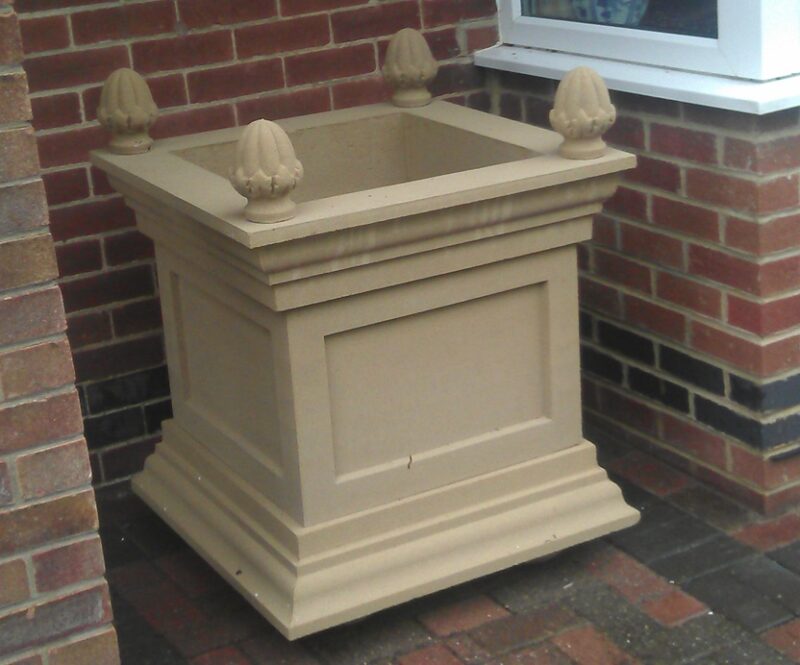 Cast stone planter, indented jardinere