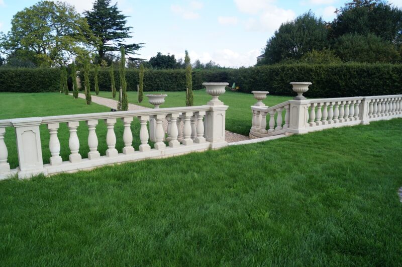 760mm cast stone balustrade in landscaped garden