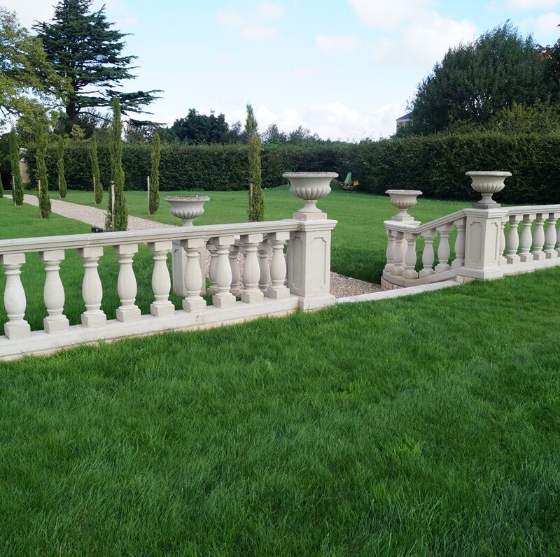 760mm cast stone balustrade in landscaped garden