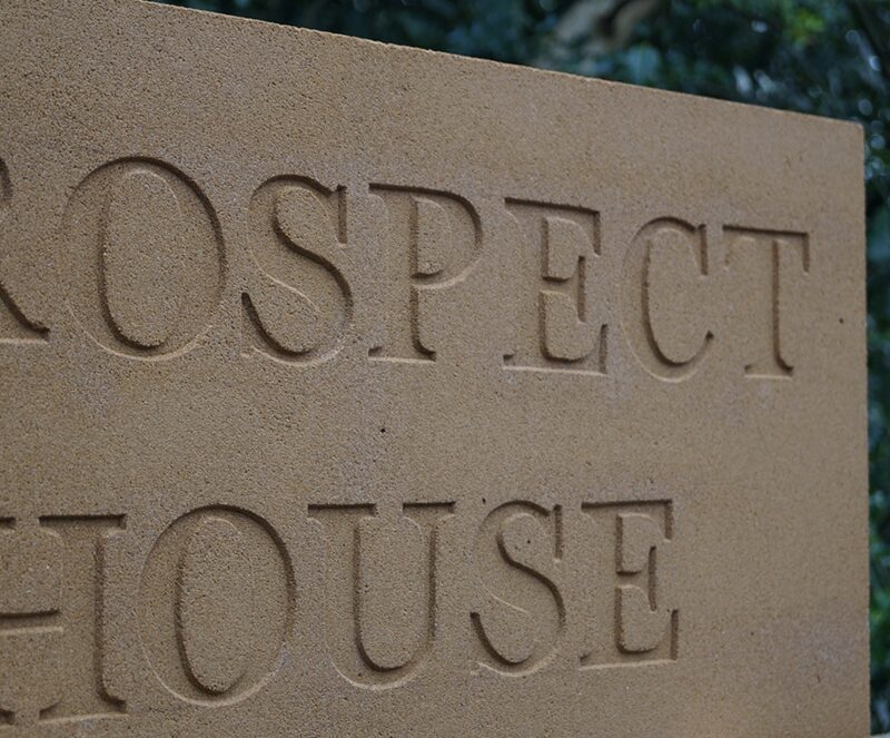 Cast Stone Plaque & Date Stones close up